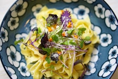 fettuccine on gray floral ceramic plate