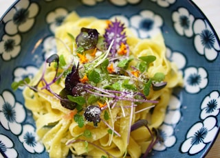 fettuccine on gray floral ceramic plate