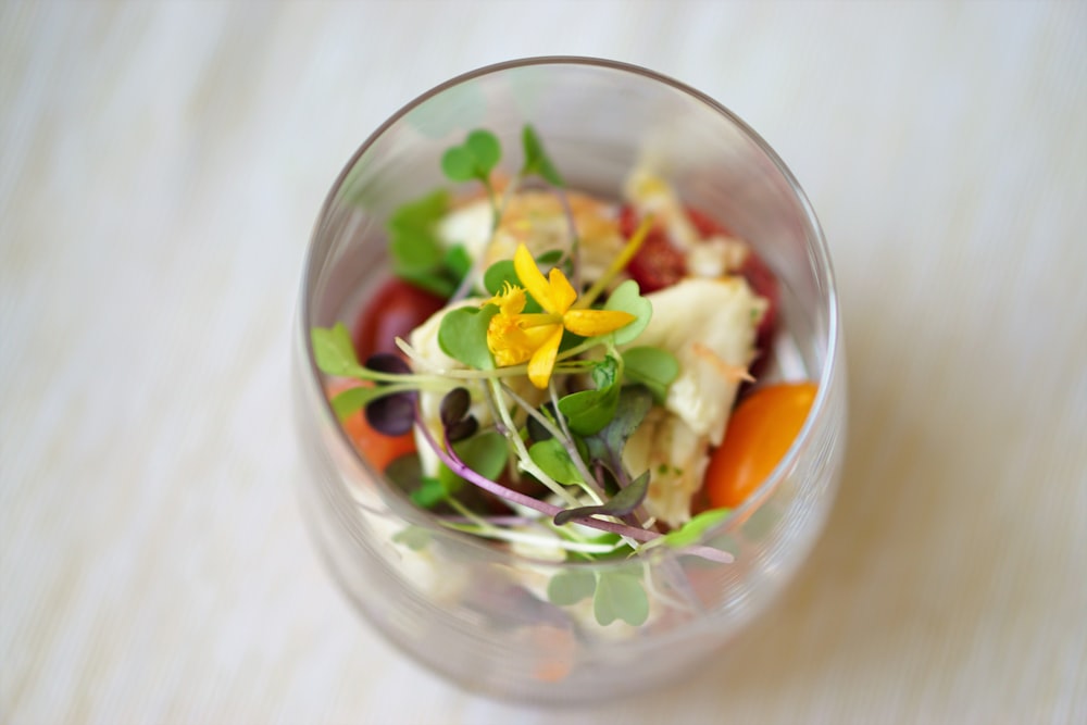 assorted spices on clear glass cup