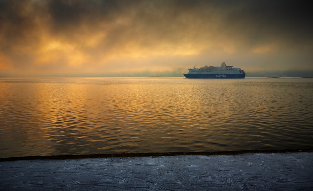 white cruise ship sailing in the ocean