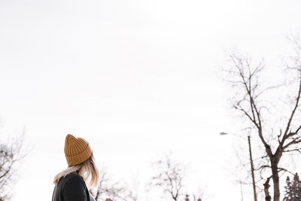 woman wearing brown beanie during daytime