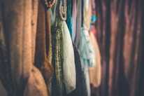 Vibrant silk textiles showcasing rich colors and smooth texture under soft lighting.