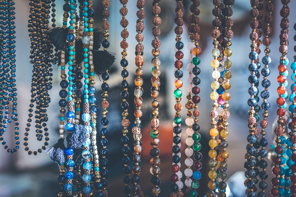 close up photo of beaded necklaces