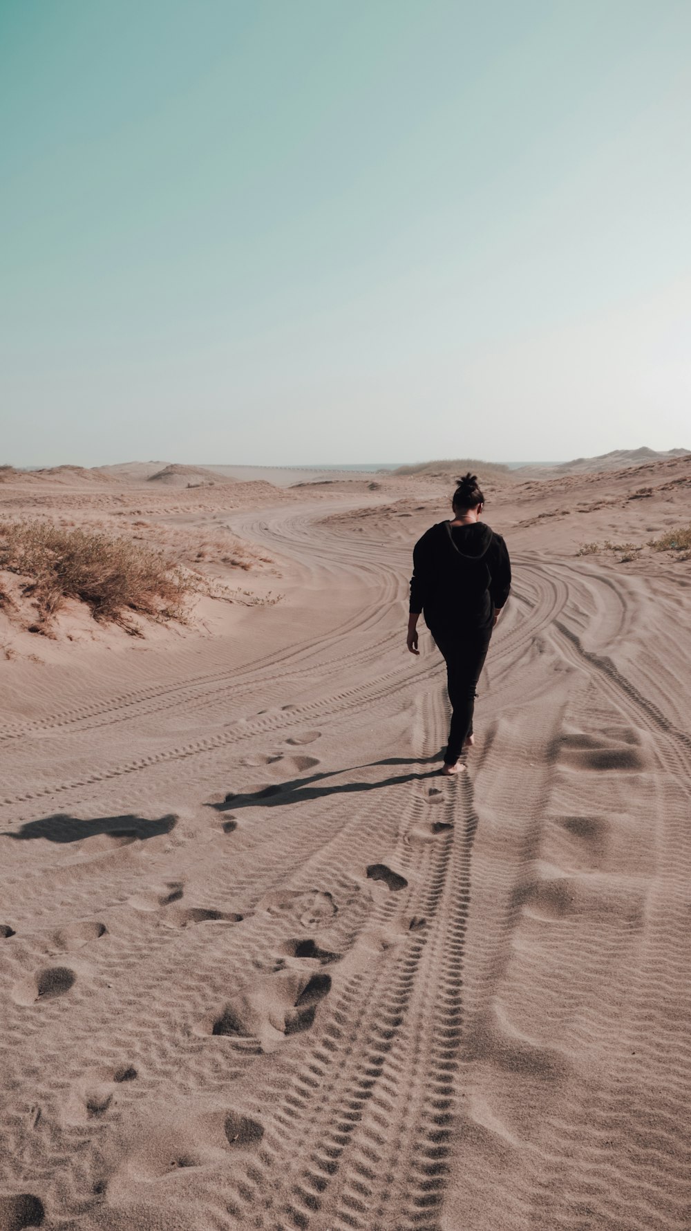 woman walking on the desert