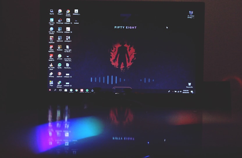 A sleek, dark-themed PC game launcher interface glowing on a modern desktop screen.