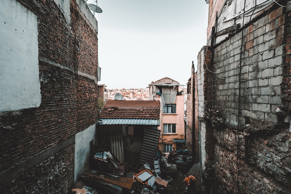 brown shed between buildings