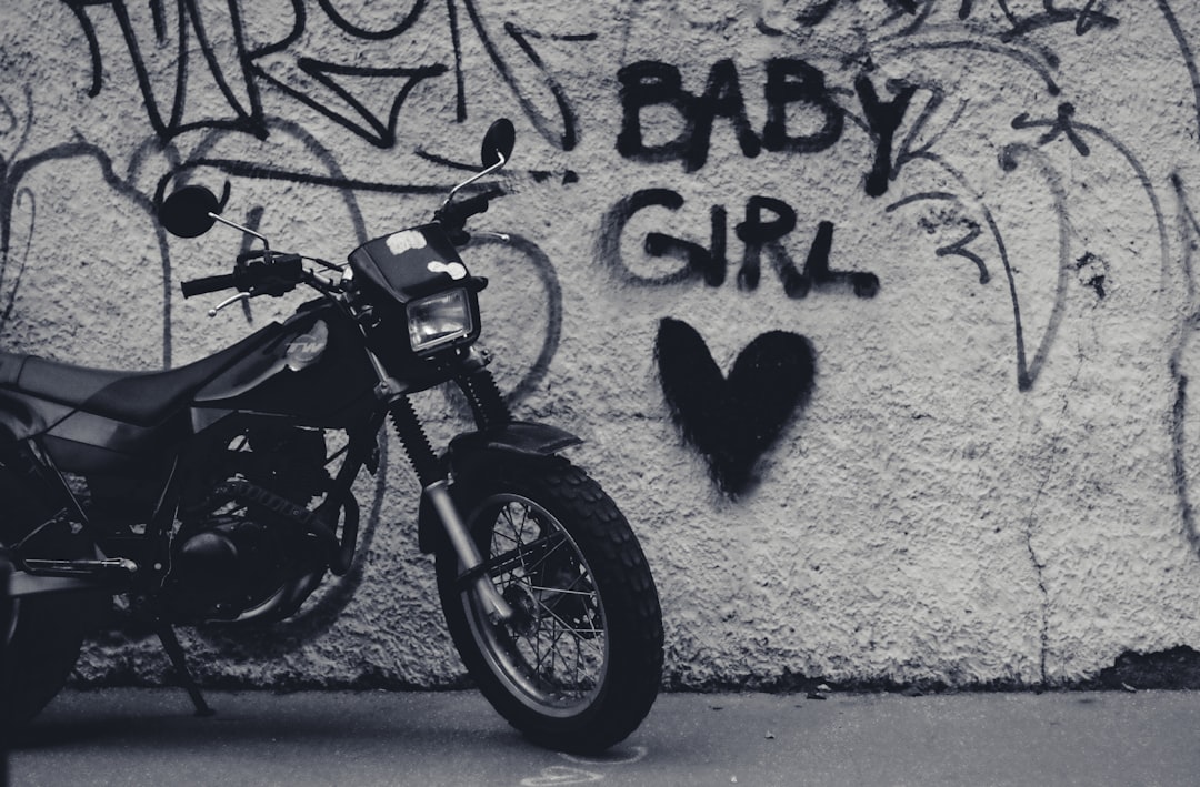motorcycle parked near wall