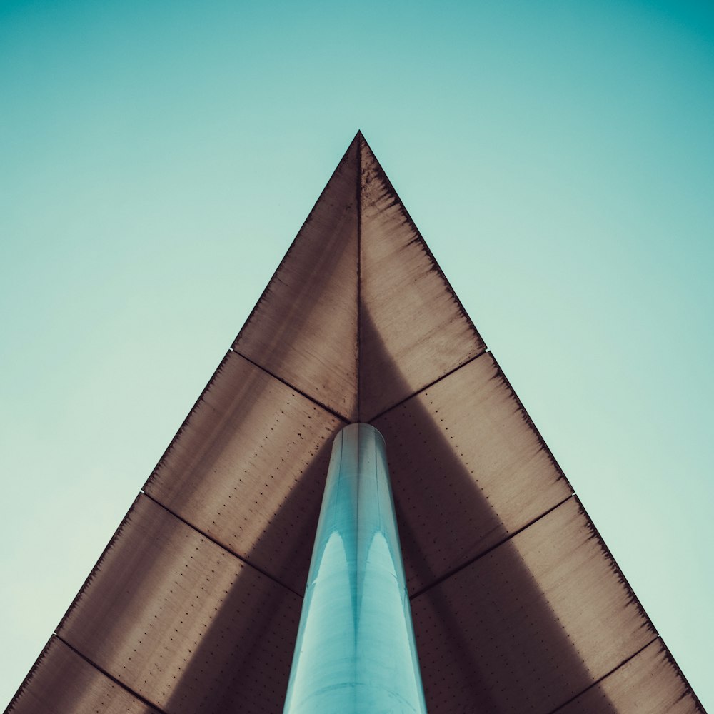 worm's eye view of building with brown roof