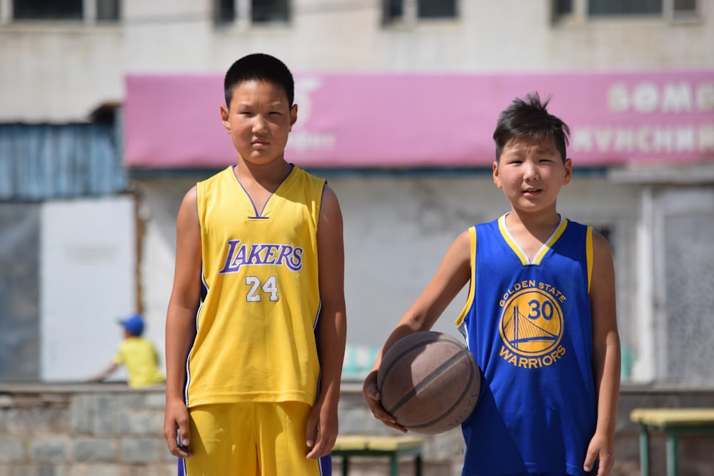 two boy standing near each other