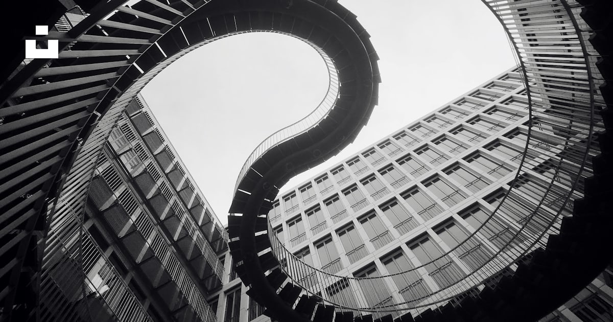 Grascale photo of spiral stairs photo – Free Kpmg Image on Unsplash