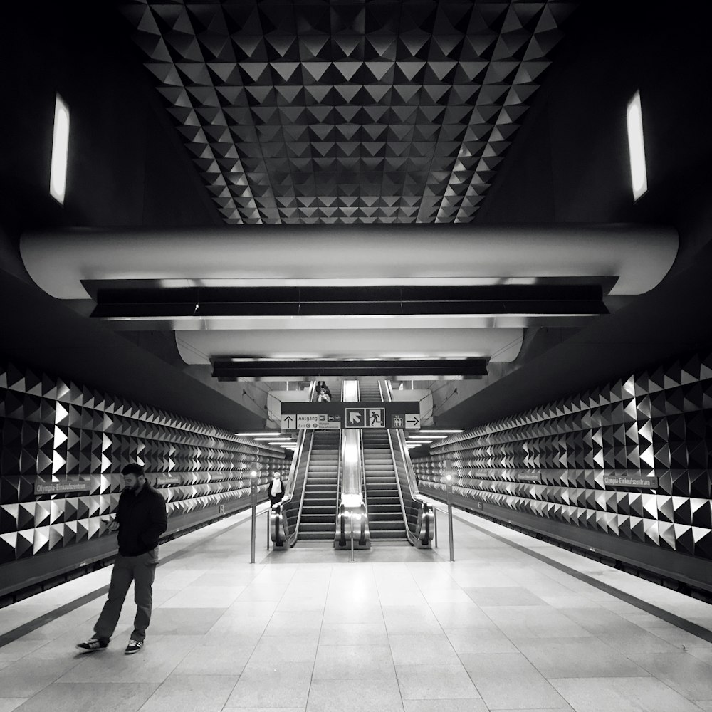 grayscale photo of escalator