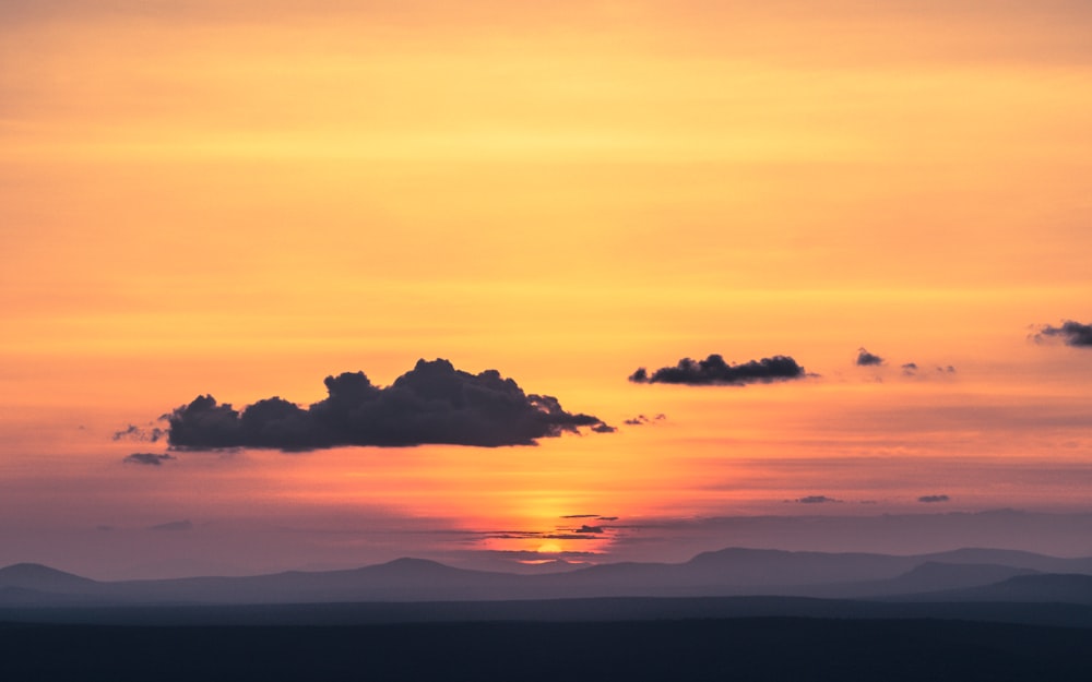 silhouette of mountains during golden hour