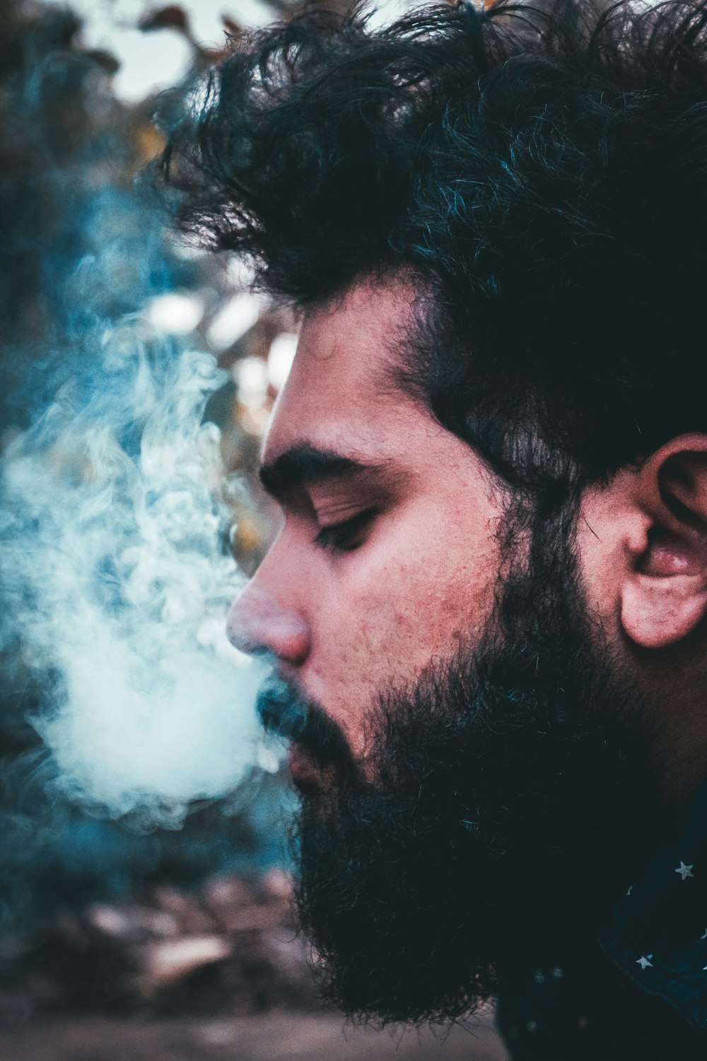 closeup photo of smoking man