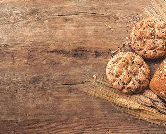 cookies, bread, and wheat on table