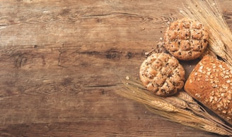 cookies, bread, and wheat on table