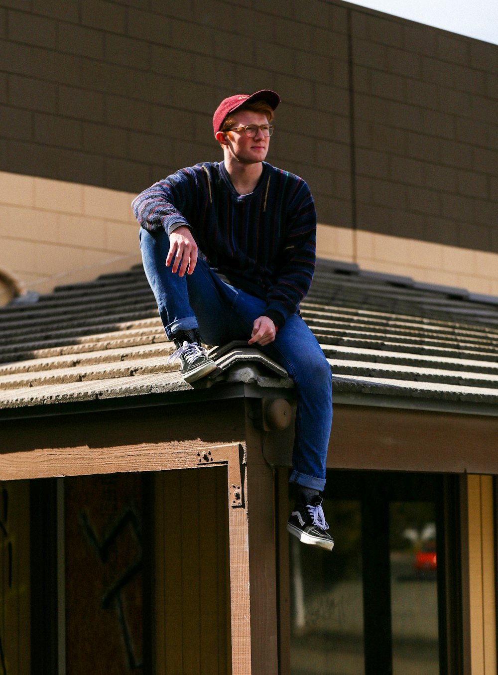 person sitting on roof