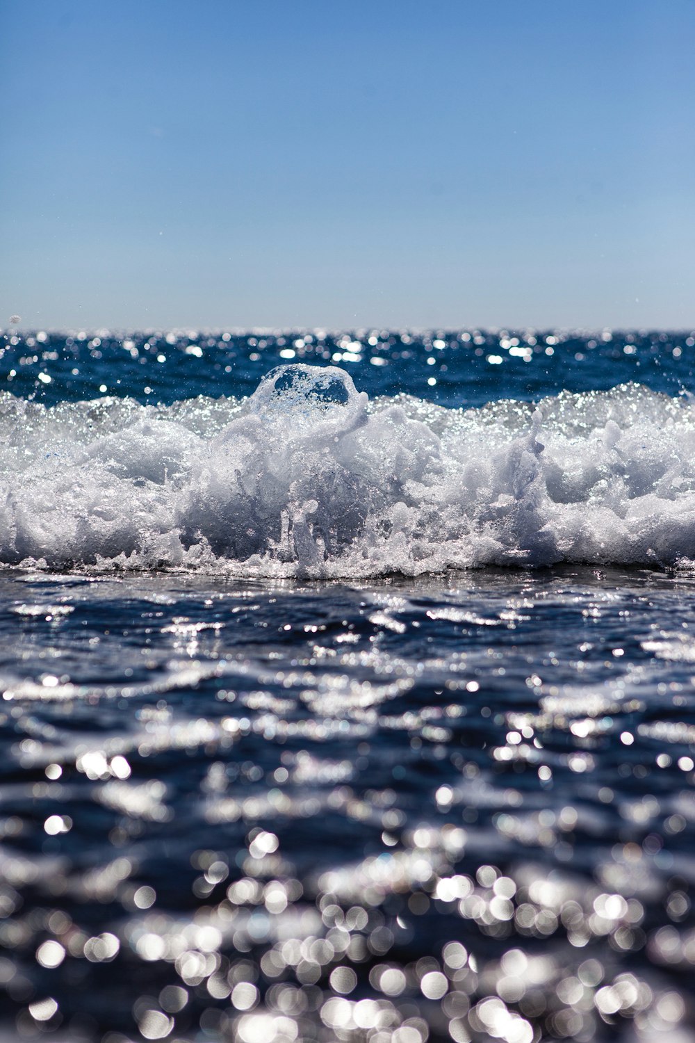 close up photography of ocean wave at daytime