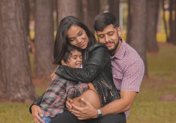 man hugging a woman