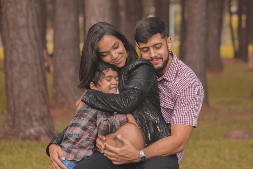 man hugging a woman