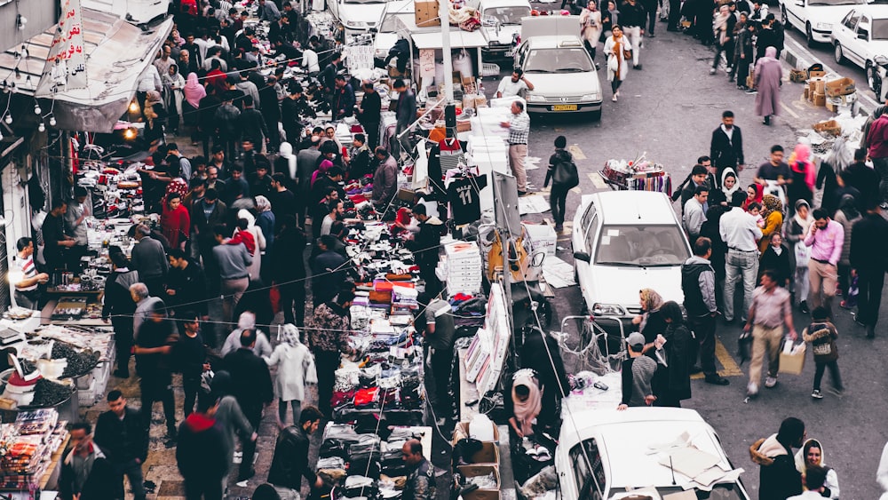 people gathering on road during daytime