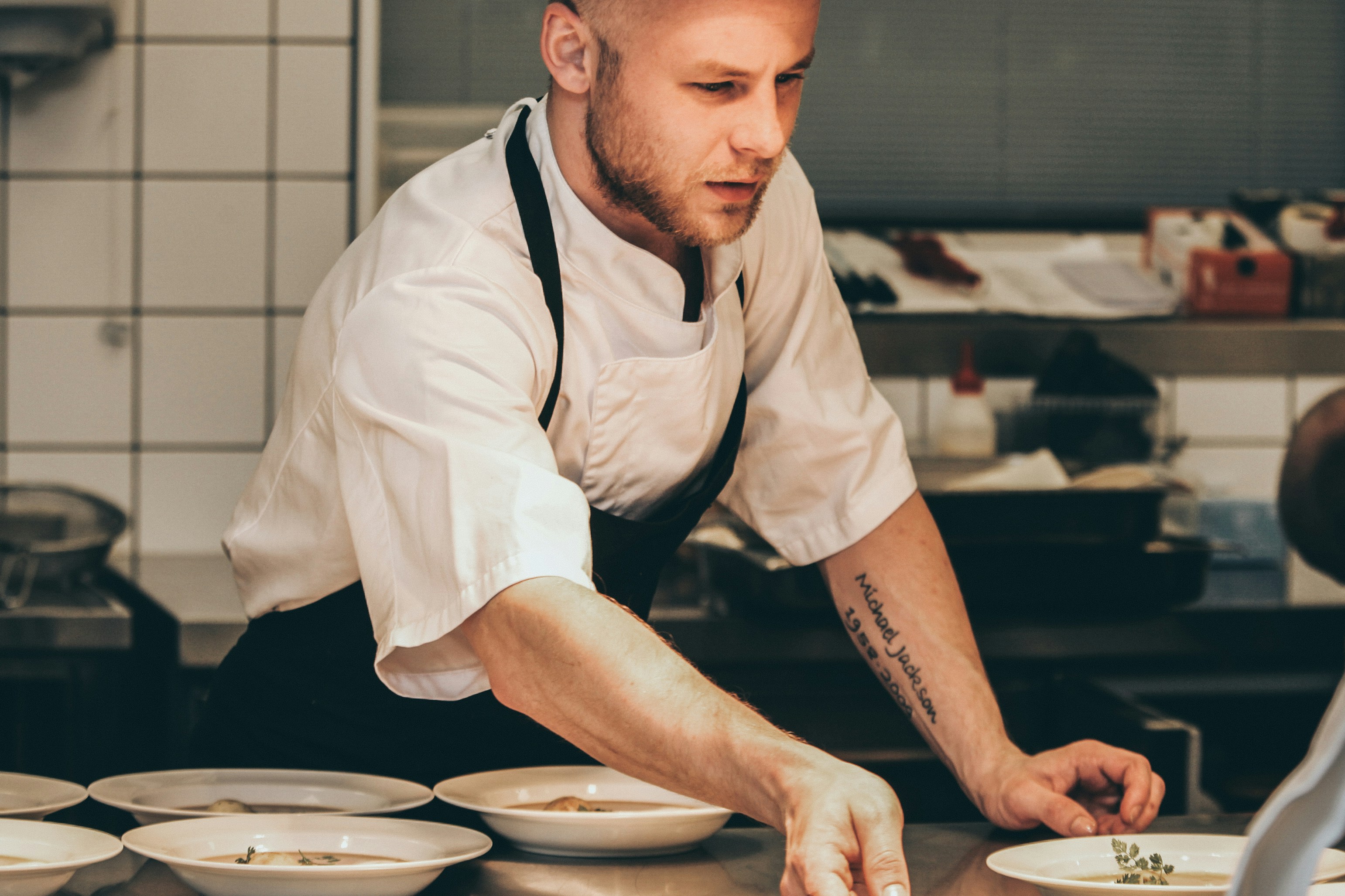 chef making dish inside the kitchen