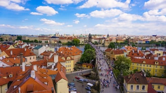 A scenic European cityscape with tourists enjoying a guided tour.