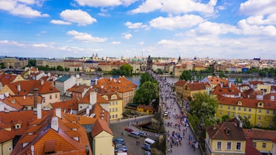 A scenic European cityscape with tourists enjoying a guided tour.