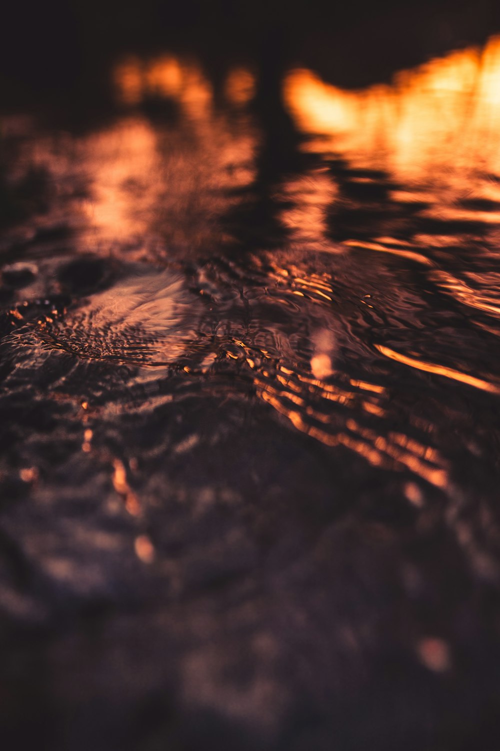 a close up of water with a blurry background