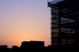 Wide shot of a completed scaffolding structure at sunset.
