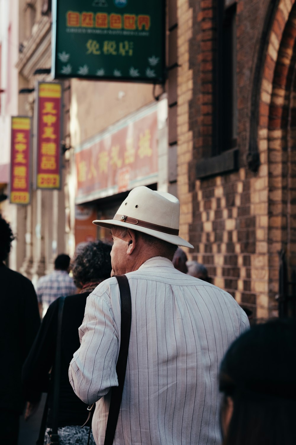 man wearing white fedora hat