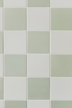 A light green themed grid with crowns placed in a neat pattern.