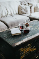 Elegant red item displayed on a rustic wooden table with natural light