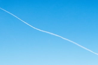 white smoke on blue sky