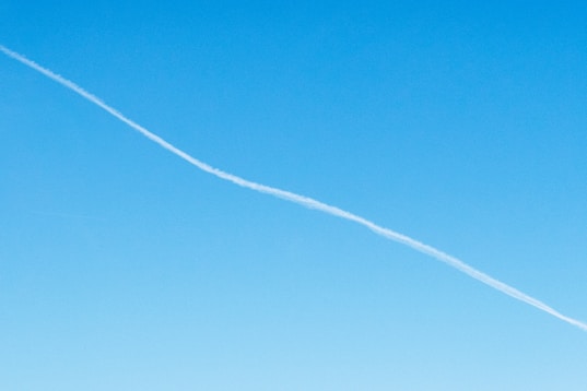 white smoke on blue sky