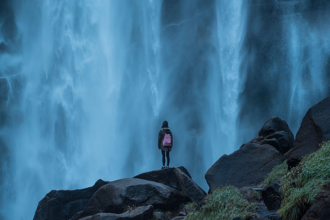 Hiking in Yosemite National Park in front of waterfall - Photo by Luo Lei | best digital marketing - London, Bristol and Bath marketing agency