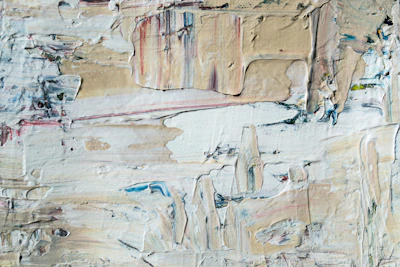 Close-up of Véronique Mazurek's textured abstract painting with layers of sand and marble powder.