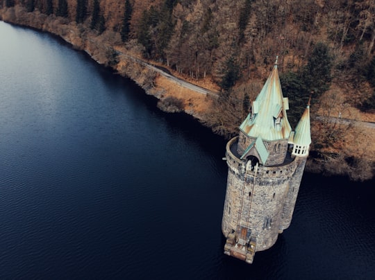 high-angle view of gray concrete castle in Lake Vyrnwy United Kingdom