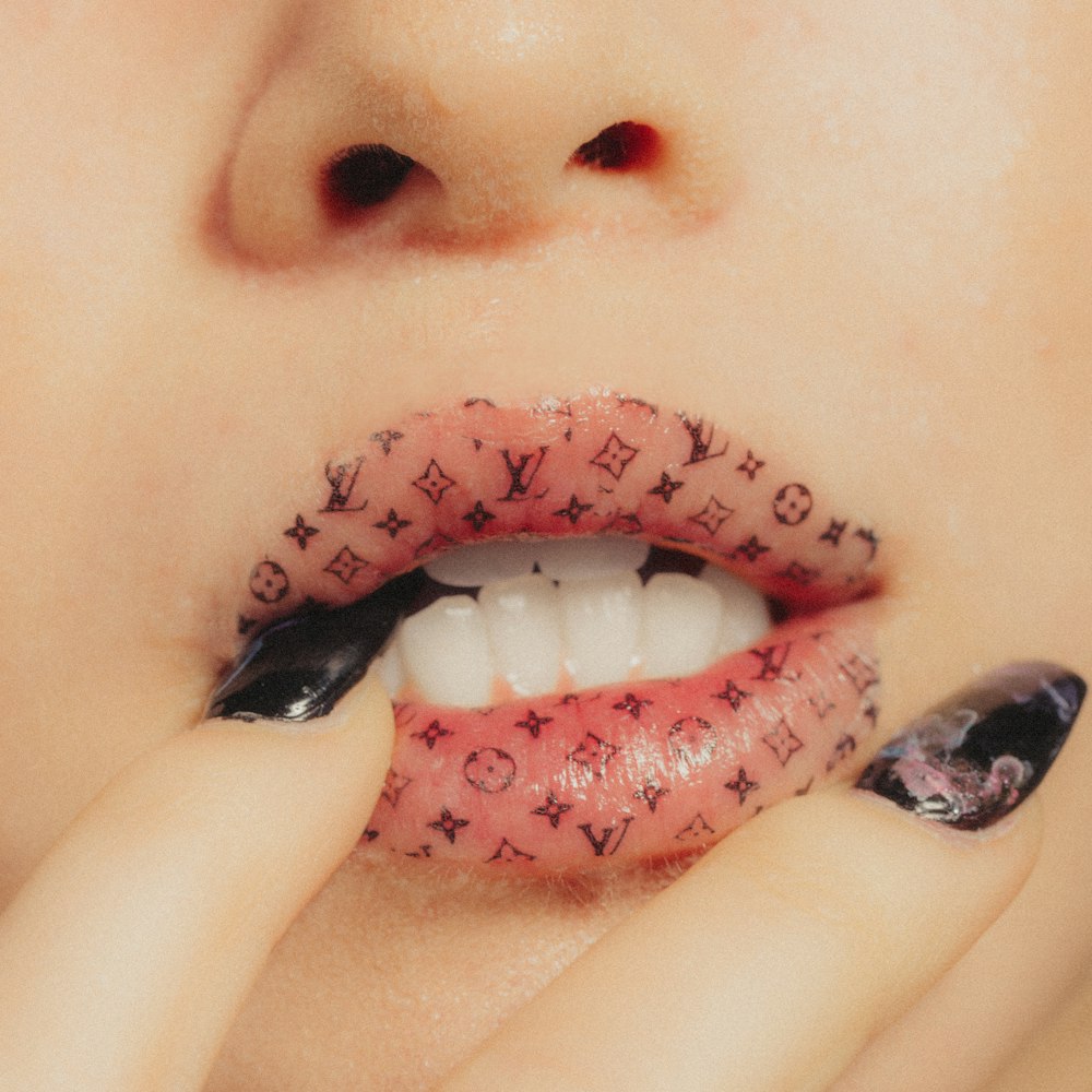 woman wearing Louis Vuitton lipstick