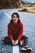 woman wearing red sweater