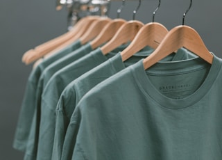 photo of blue crew-neck tops