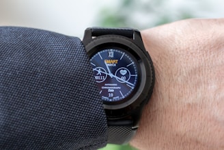 person showing smartwatch displaying 11:19