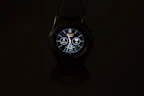 A modern smartwatch displaying fitness stats on a wrist.