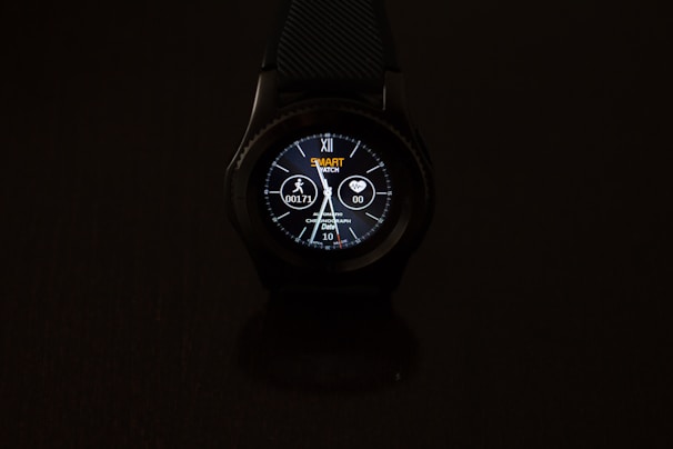 Modern smartwatch displaying fitness stats on a wrist against a clean, bright background