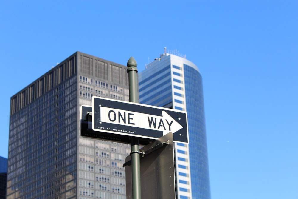 One Way signage on high-rise building