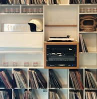 vinyl sleeves on white wooden cube shelf