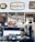 A cozy cafe interior featuring vintage signs and decor. Shelving above a coffee counter displays an array of colorful mugs, teapots, and retro advertisements. A person is working behind the counter, which is neatly arranged with stacks of plates, glassware, and other cafe essentials.