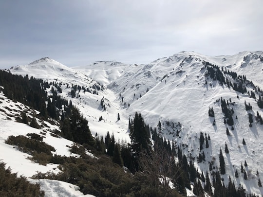 landscape photography of mountains covered with snow in Almaty Kazakhstan