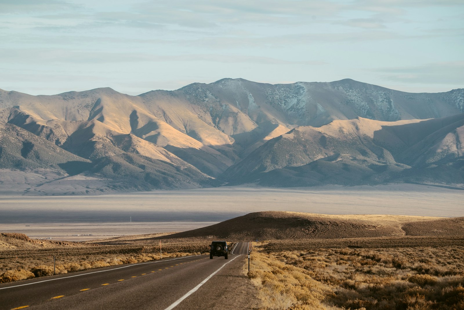 Sony a7S II + Sony FE 70-200mm F4 G OSS sample photo. Vehicle speeding on road photography