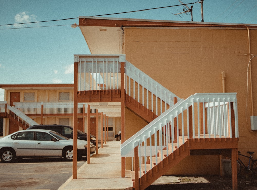 two vehicles parked in front of establishment