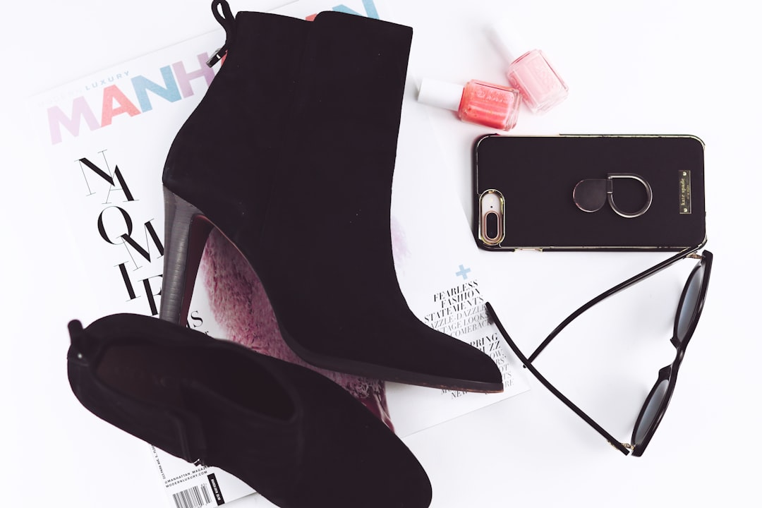 Photo of designer items on white table top.